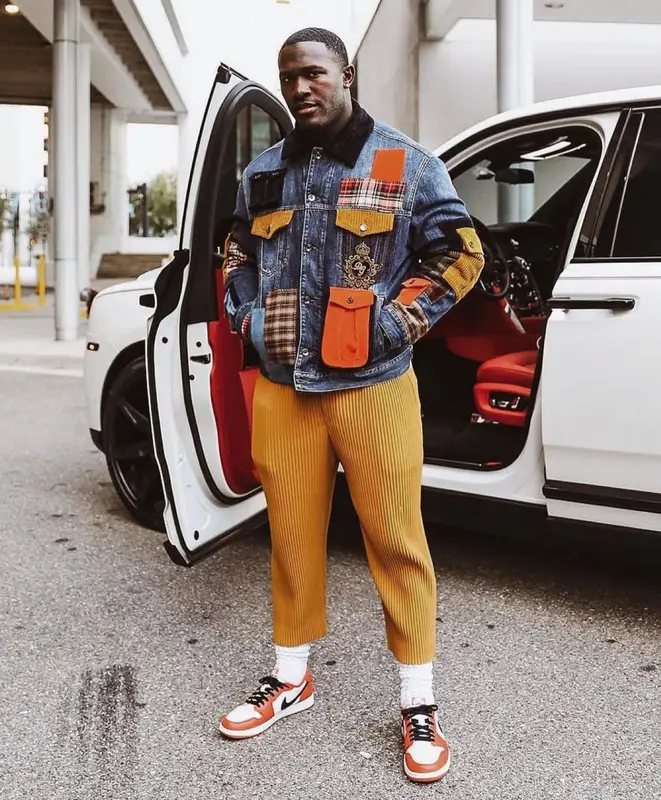 Devin White outfit in Dolce & Gabbana, Homme, and Issey Miyake, 2021
