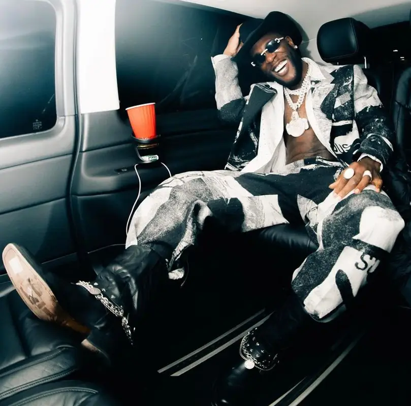 Burna Boy outfit in Off-White, Bottega Veneta, and Pablo Tomek, 2021