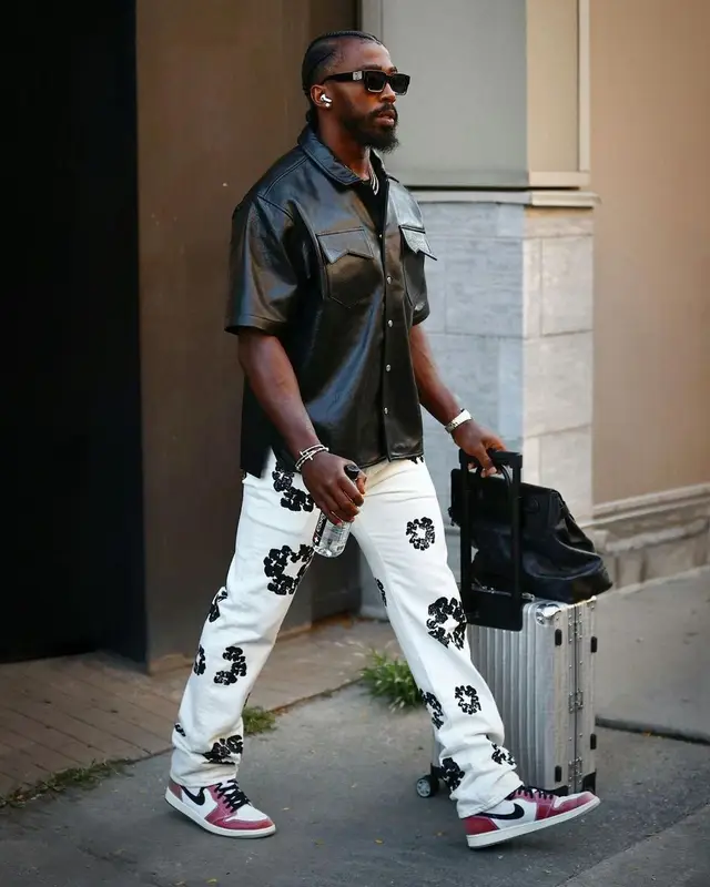 Tyrod Taylor outfit in Levi’s, Louis Vuitton, and Denim Tears, 2021