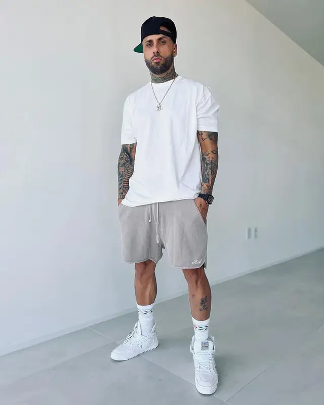 Nicky Jam outfit in Kith, Off-White, and Casablanca, 2021