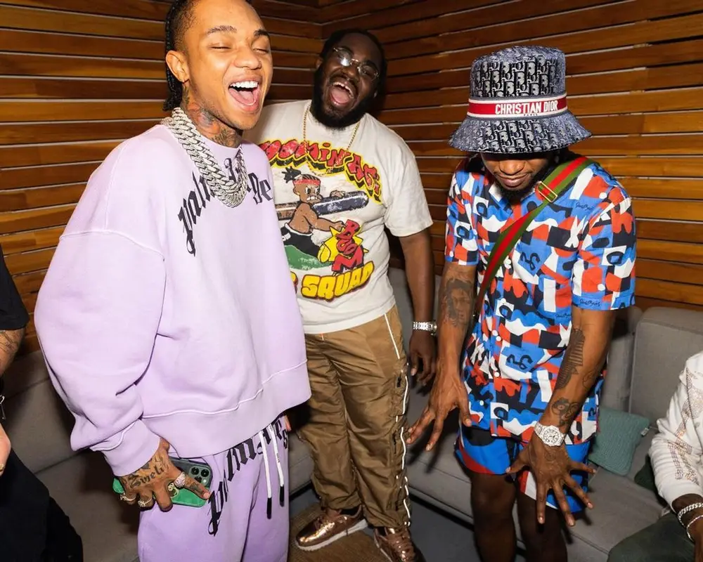 Slim Jxmmi outfit in Orlebar Brown, Gucci, and Dior, 2021