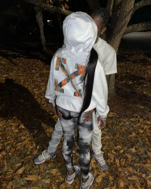 Quando Rondo outfit in Off-White, Purple Brand, and Jordan, 2021
