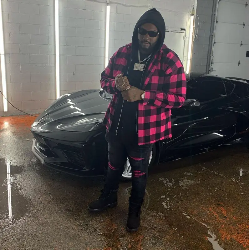Peezy outfit in Palm Angels, Amiri, and Versace, 2021
