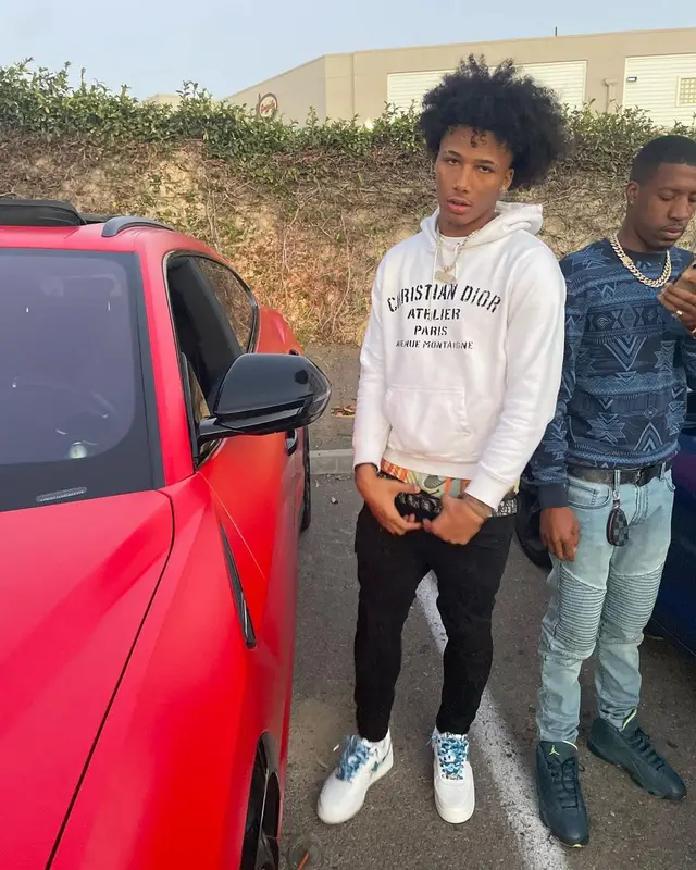 Mikey outfit in Dior, Valabasas, and A Bathing Ape, 2021
