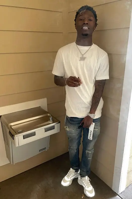 Quando Rondo outfit in Dior and Purple Brand, 2021
