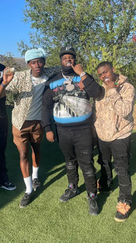 Maxo Kream outfit in Amiri, Jordan, and New Era, 2021