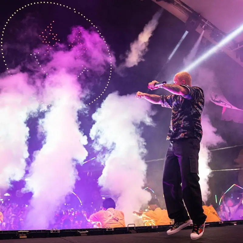 J Balvin outfit in Louis Vuitton, Dior, and Kenny Scharf, 2021