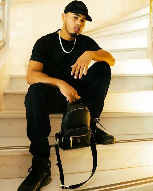Myke Towers outfit in Jordan, Prada, and Drake Merch, 2021