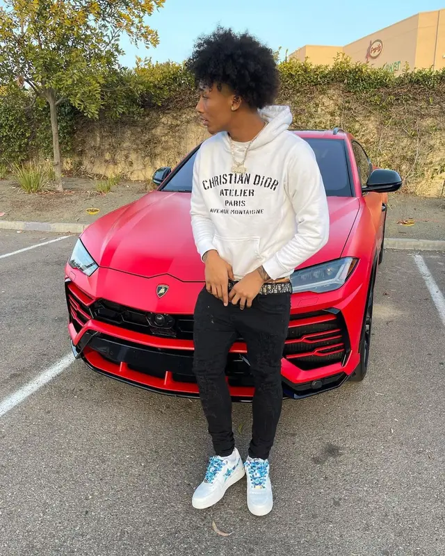 Mikey outfit in Dior, Valabasas, and A Bathing Ape, 2021