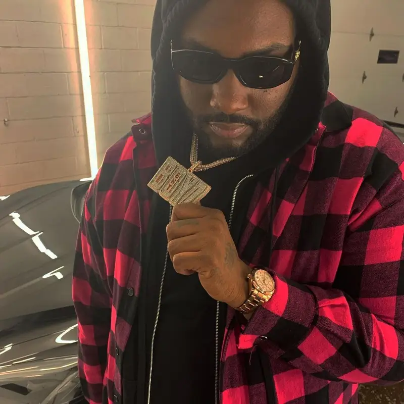Peezy outfit in Palm Angels, Amiri, and Versace, 2021