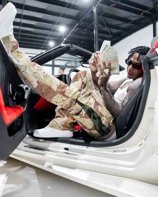 Moneybagg Yo outfit in Balenciaga, Gallery Dept., and Prada, 2021