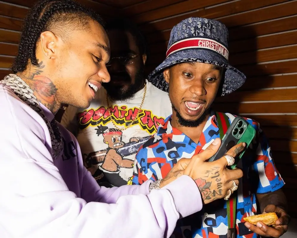 Slim Jxmmi outfit in Orlebar Brown, Gucci, and Dior, 2021