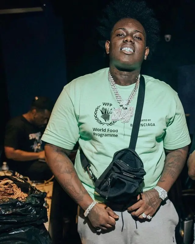 Sheff G outfit in Balenciaga, Nike, and WFP, 2021