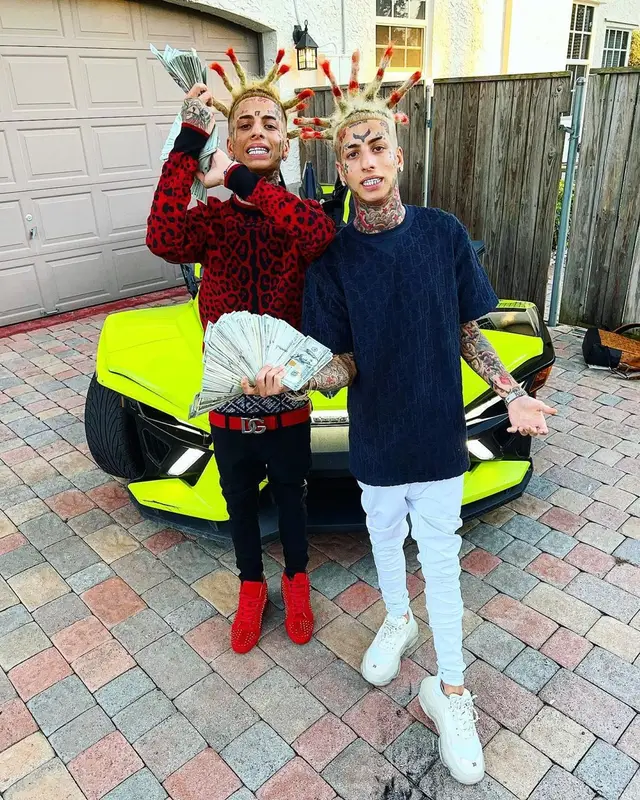 Flyysoulja outfit in Dolce & Gabbana, Christian Louboutin, and MCM, 2021