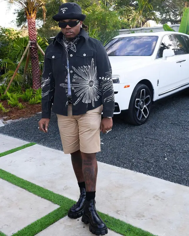 Gunna outfit in Chanel, Balenciaga, and Prada, 2021