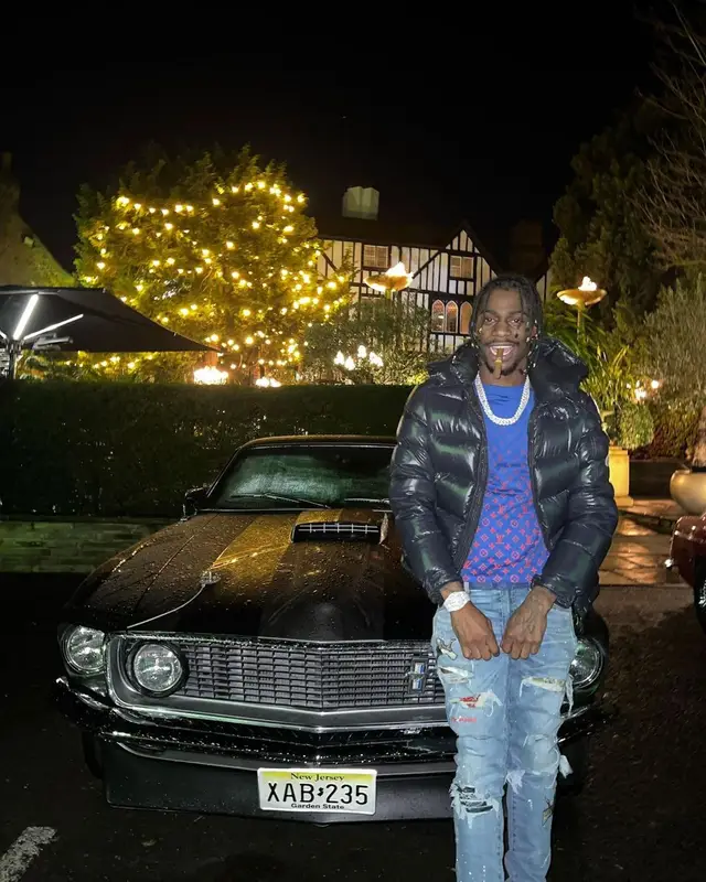 Russ Millions outfit in Moncler, Louis Vuitton, and Amiri, 2021