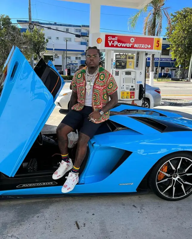 Gunna outfit in Bode, Louis Vuitton, and Cartier, 2021