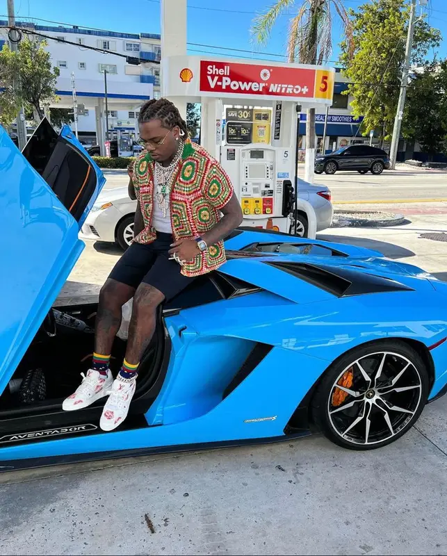 Gunna outfit in Bode, Louis Vuitton, and Cartier, 2021