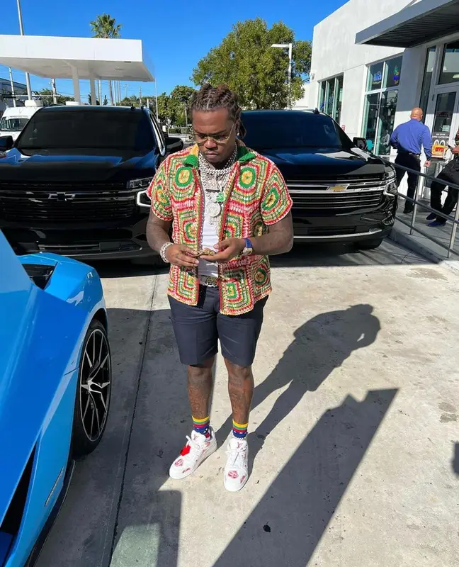 Gunna outfit in Bode, Louis Vuitton, and Cartier, 2021