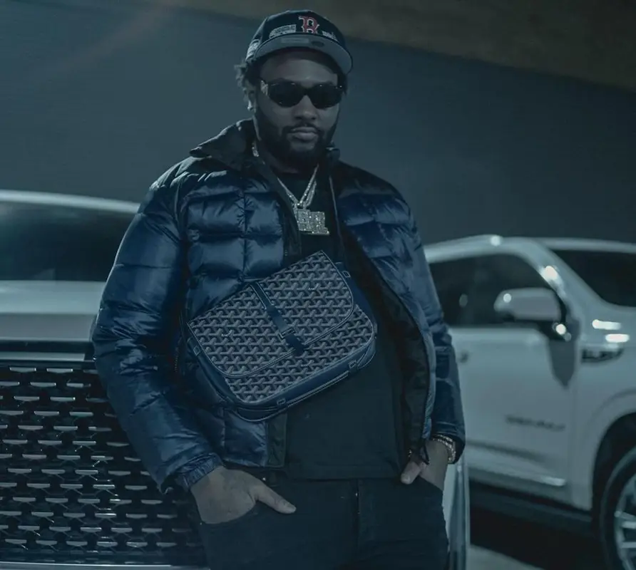 Peezy outfit in Prada, Versace, and New Era, 2021