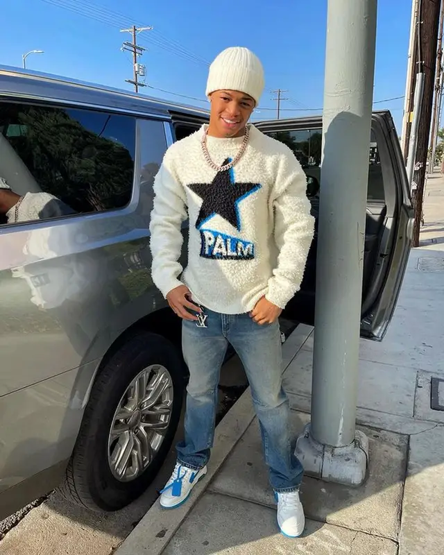 YK Osiris outfit in Palm Angels, Moncler, and Louis Vuitton, 2021