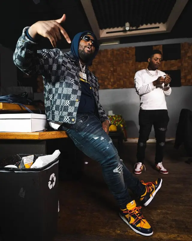 Peezy outfit in Louis Vuitton, Amiri, and Versace, 2021
