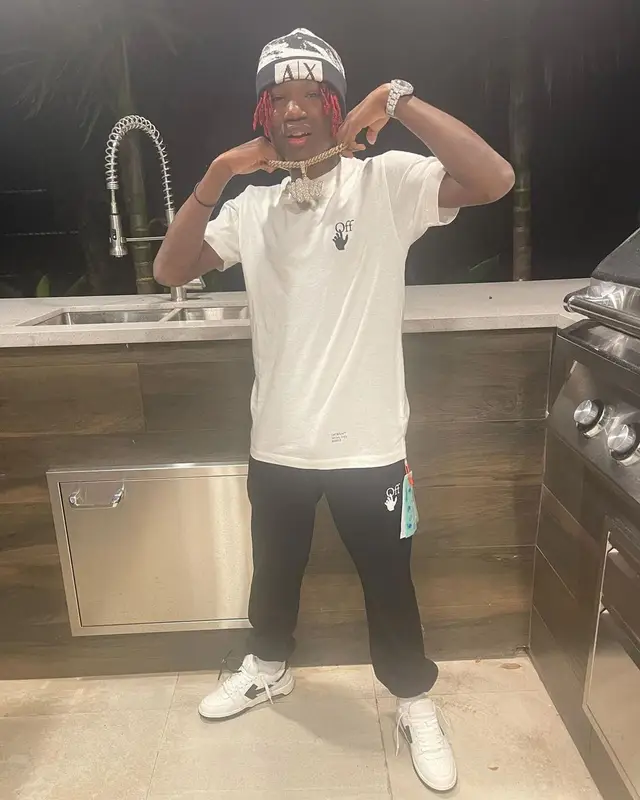 YNW BSlime outfit in Off-White and Armani Exchange, 2021