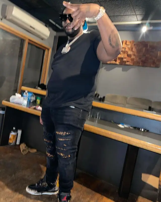 Peezy outfit in Amiri, Jordan, and Louis Vuitton, 2021