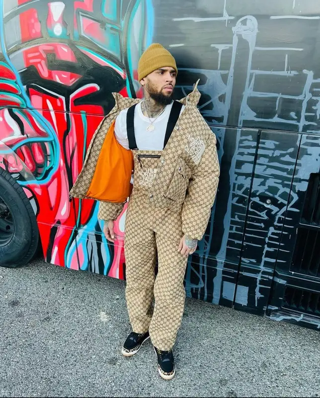 Chris Brown outfit in Gucci, Jordan, and The North Face, 2021