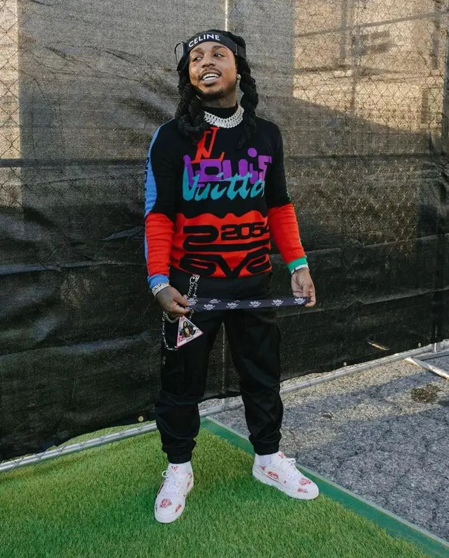 Jacquees outfit in Louis Vuitton, Prada, and Celine, 2021