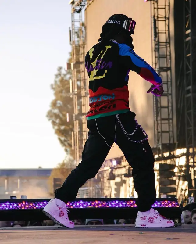 Jacquees outfit in Louis Vuitton, Prada, and Celine, 2021
