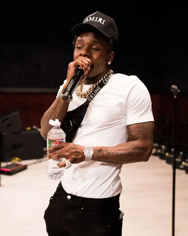 DaBaby outfit in Burberry, Amiri, and Playboy, 2021