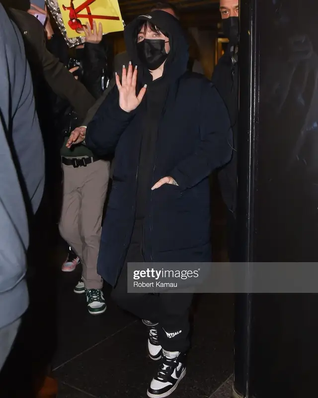 Billie Eilish outfit in Fear of God, Nike, and Ambush, 2021