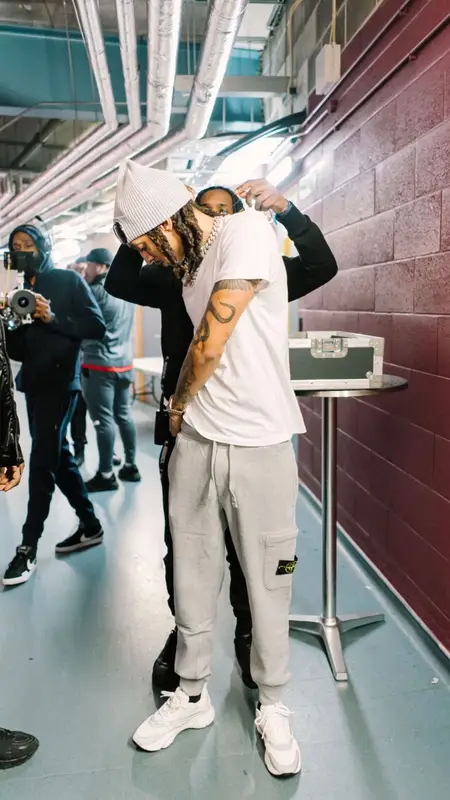 Young Adz outfit in Stone Island, Dior, and C.P. Company, 2021