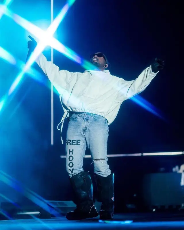 Kanye West outfit in Louis Vuitton, Nigo, and Icon, 2021