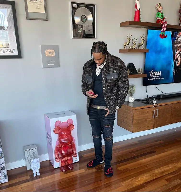 Fivio Foreign outfit in Amiri, Nike, and Louis Vuitton, 2021