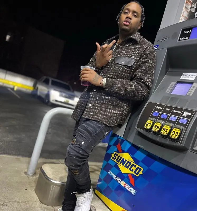 Fivio Foreign outfit in Amiri, Nike, and Louis Vuitton, 2021