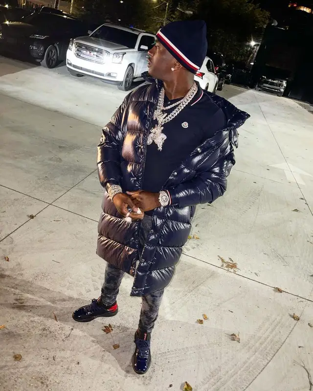 Bankroll Freddie outfit in Purple Brand, Prada, and Moncler, 2021