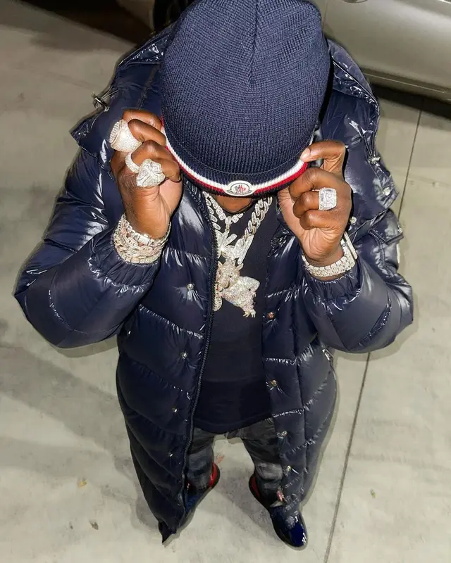 Bankroll Freddie outfit in Purple Brand, Prada, and Moncler, 2021