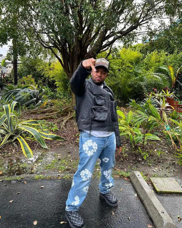 Mustard outfit in Louis Vuitton, Levi’s, and Denim Tears, 2021