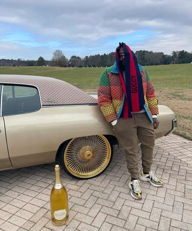 Rick Ross outfit in Gucci and Cartier, 2021