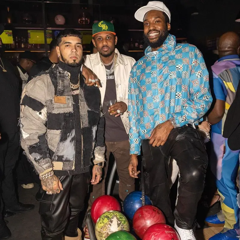 Meek Mill outfit in Louis Vuitton, Amiri, and Nike, 2021