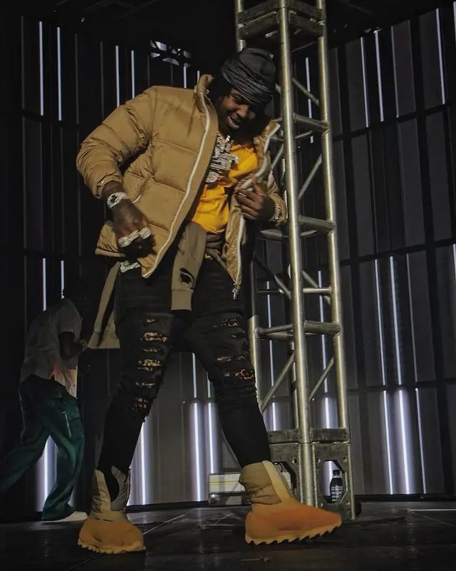EST Gee outfit in Moncler, Amiri, and Yeezy, 2021