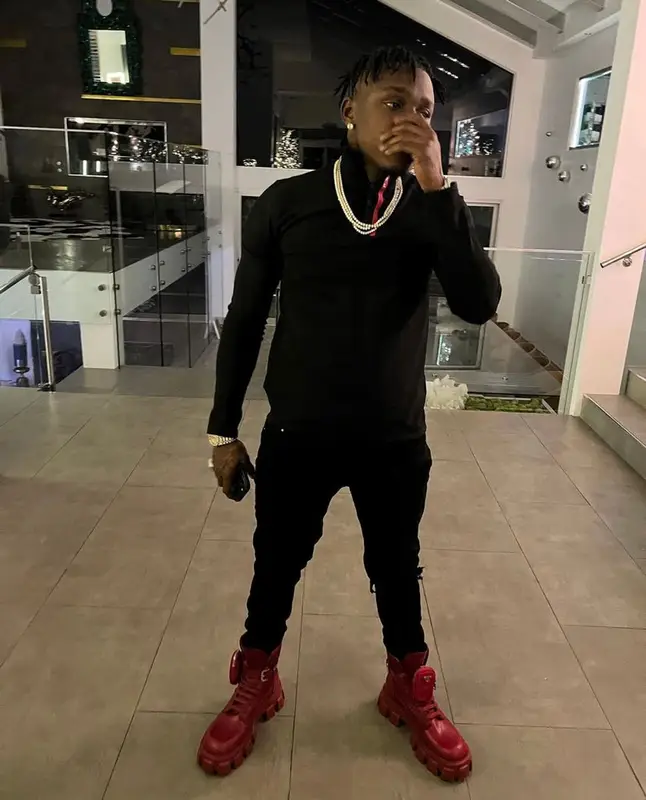 DaBaby outfit in Prada and Amiri, 2021
