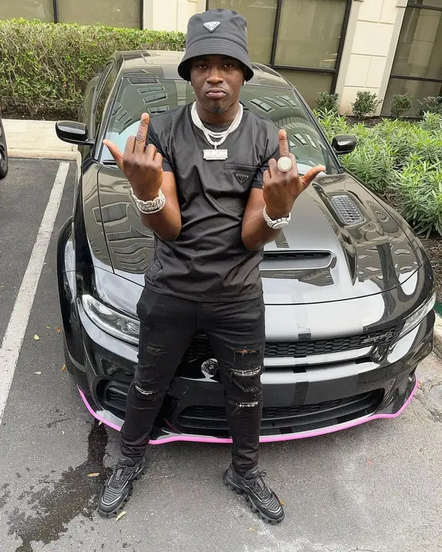 Bankroll Freddie outfit in Amiri and Prada, 2021