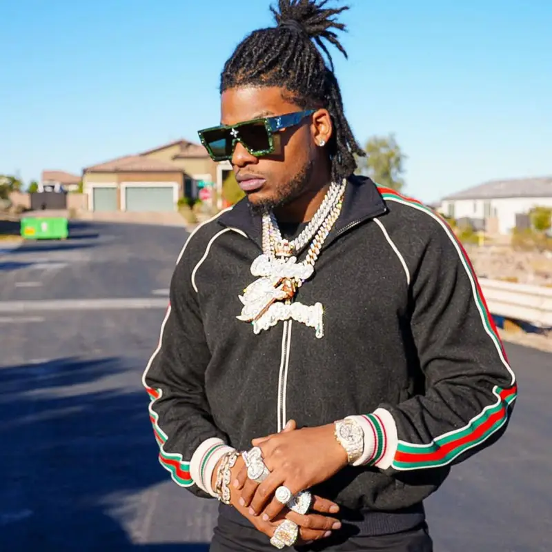CJ So Cool outfit in Gucci, Jordan, and Louis Vuitton, 2021