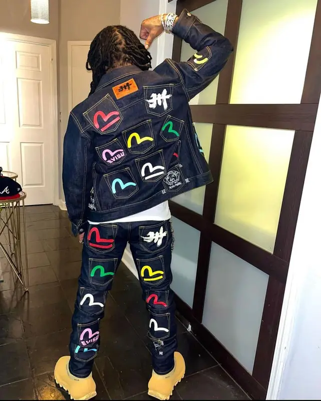 Jacquees outfit in Evisu, Yeezy, and New Era, 2021