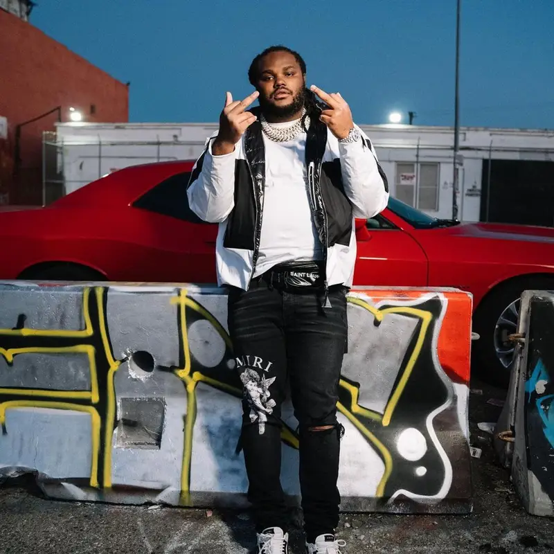Tee Grizzley outfit in Moncler, Amiri, and Saint Laurent, 2021