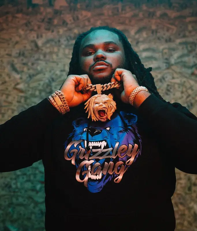 Tee Grizzley outfit in Amiri, Saint Laurent, and Louis Vuitton, 2021