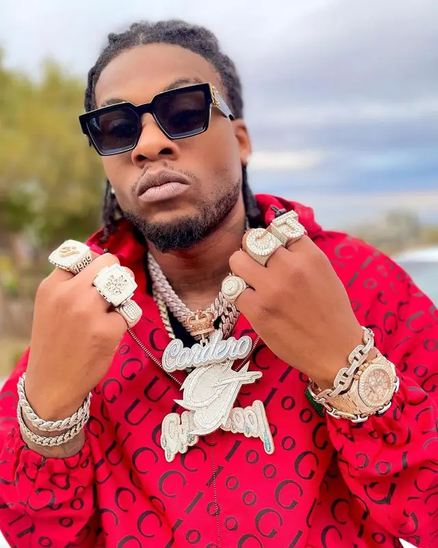 CJ So Cool outfit in Gucci, Amiri, and Louis Vuitton, 2021